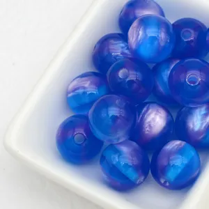 Perles œil de chat effet gélifié de 12mm, vue détaillée pour bracelets faits main et pendentifs DIY.