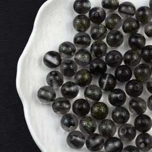 16mm glitter cat eye resin beads detail showing sparkling starry sky design for DIY jewelry.