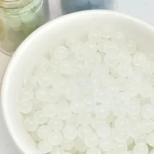 Close-up detail of 4mm white glass loose beads for DIY handmade jewelry bracelets necklaces