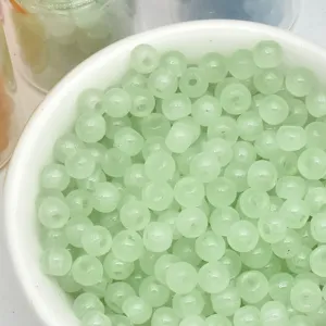 Green glass beads detail shot, 4mm round pony beads for DIY handmade bracelets jewelry accessories.