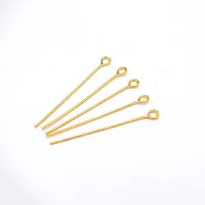 Detailed view of 18k gold plated eye pins for DIY jewelry making and beading crafting accessories.