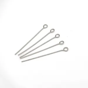 Silver eye pins detail shot, metal wire pin findings for handmade jewelry DIY craft design.