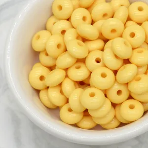Yellow abacus spacer beads wheel shaped DIY jewelry accessories for bracelets and necklaces.