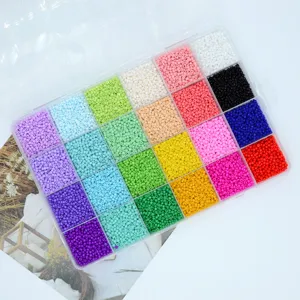Colorful glass seed beads set for DIY jewelry making craft inside a clear storage box