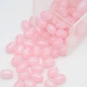 Perles ovales en résine pailletée rose pour accessoires de fabrication de bijoux.