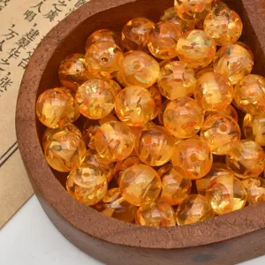Amber resin round loose beads for DIY bracelets, necklaces, and jewelry making accessories.