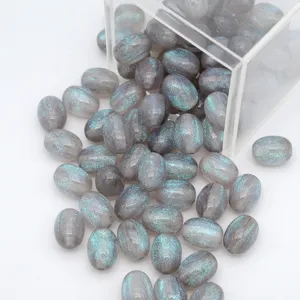 Vue détaillée de perles en résine ovale grise pailletées pour accessoires de bijoux de bracelet DIY.