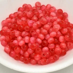 4mm brushed cat-eye glass beads close-up, red spacer beads for handmade DIY jewelry design.