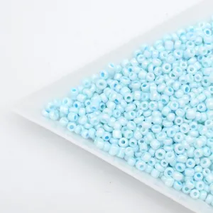 Light blue glass seed beads detail, sparkling barrel shape beads for DIY handmade bracelets accessories.