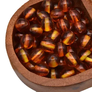 Imitation amber resin loose round beads with golden stripes for DIY handmade bracelet making.