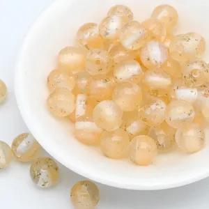 Gold foil resin loose beads for DIY jewelry making, close-up details of starry craft beads.