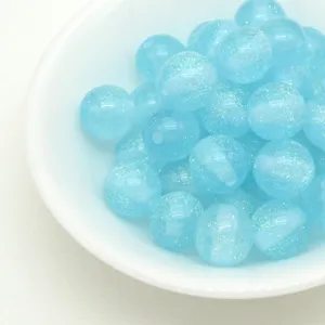 Sparkly jelly blue resin round loose beads for DIY handmade bracelets and phone charm making.