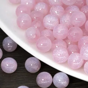 Pink glitter resin round loose beads detail shot for DIY handmade beaded jewelry accessories