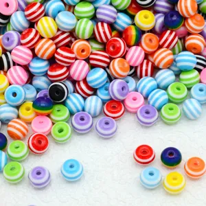 Colorful striped resin beads detail, ideal for DIY handmade crafts and jewelry accessories.