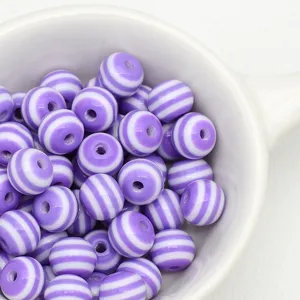 Purple white striped resin beads detail, perfect for DIY handmade jewelry crafts and phone charms.