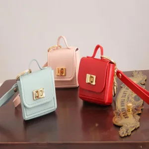 Bonito mini mochila llavero monedero estuche de auriculares portátil PU diseño nuevo