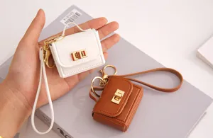 Mini bolso de cuero PU llavero lindo estuche de auriculares bolsa de almacenamiento portátil