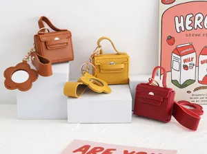 Mini PU lederen tas sleutelhanger detail, schattige oortelefoon etui hanger met spiegel.