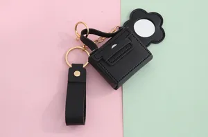 PU lederen mini handtas sleutelhanger met bloem spiegel, stijlvolle oordopjes tas hanger.