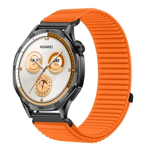 Smartwatch with bright orange braided nylon strap and black case, showing fitness data.