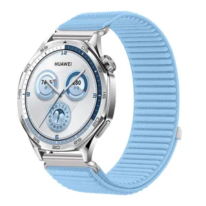 Details of light blue woven nylon watch strap compatible with smart watches, precision fit.