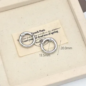 Silver metal spring rings 13.5mm and 20mm detail view for DIY crafts and bag accessories.