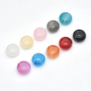 Colorful sparkly resin large hole beads detail shot for DIY jewelry craft and phone chain parts.