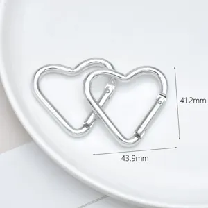 Silver heart-shaped alloy carabiner keychain clips, perfect for DIY crafts and accessories.