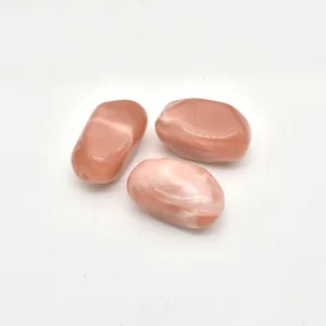 Detail shot of irregular swirled acrylic beads, pink imitation stone for DIY jewelry making accessories.