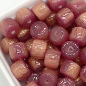 Resin marbled barrel beads for DIY jewelry making, clothing accessories and craft projects.