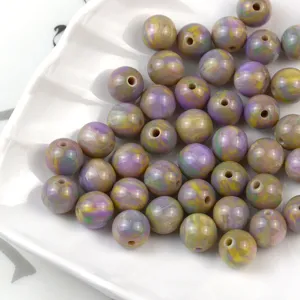 Colorful swirled resin round beads for DIY handmade bracelets, necklaces, and jewelry accessories.