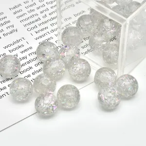 Transparent resin spacer beads with colorful foil flakes for DIY handmade jewelry crafting.