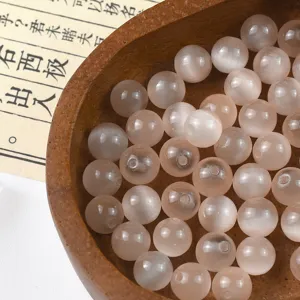 Macaron pink cat eye glass loose beads for DIY handmade bracelets and necklaces jewelry making.