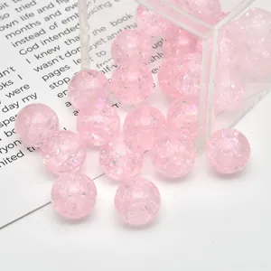 Pink sparkling resin round beads for DIY bracelets, phone charms and jewelry making accessories.