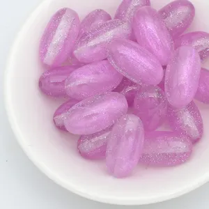 Detailed close-up view of 18mm mermaid glitter oval beads for DIY jewelry craft.