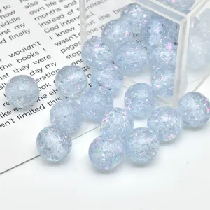Close-up detail of light blue translucent opal resin glitter beads for DIY jewelry making accessories.