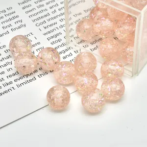 Pink translucent opal resin round beads with sparkles for DIY jewelry making and keychains.