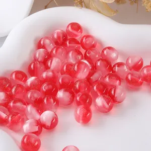 Red glitter resin round beads close up detail shot for DIY jewelry making accessories