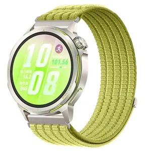 Detail view of green woven nylon loop watch band for smartwatches, breathable and stylish design.