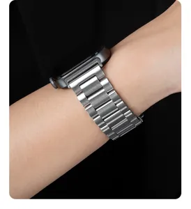 Stainless steel link watch band close-up, premium metal strap wrist detail shot for smartwatches.