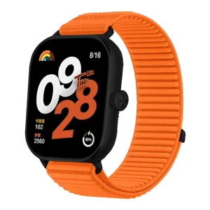 Close-up of vibrant orange woven nylon watch strap detail compatible with smartwatches.