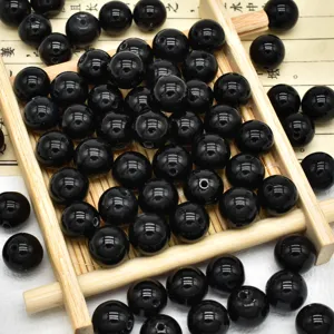 Perline tonde in pietra nera, perline sciolte lisce per la creazione di gioielli con bracciali.