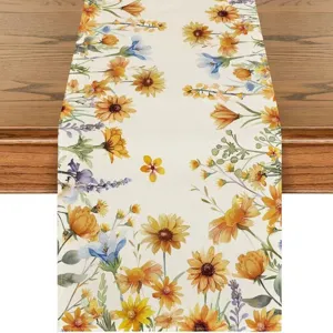 Close-up of the linen table runner with vibrant yellow and blue wild floral prints for decor.