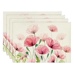 Detail view of pink watercolor poppy floral linen placemats set, perfect for spring home decor.