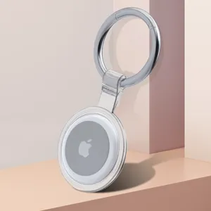 Clear protective case detail for Apple AirTag featuring durable TPU shell and metal keyring hook.