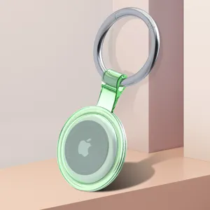 Transparent green protective case for Apple AirTag with silver keyring, TPU cover tracker holder.
