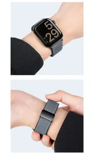 Close-up detail of the grey leather watch strap featuring a sleek black magnetic folding clasp.