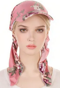 Floral print sun visor headscarf detail view, lightweight fabric hat with elegant draping ties.