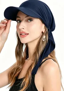 Detail view of the navy blue sun visor turban hat, showing lightweight fabric and curved brim.