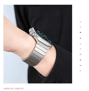 Titanium metal link watch strap detail shot showcasing premium texture and comfortable wrist fit.